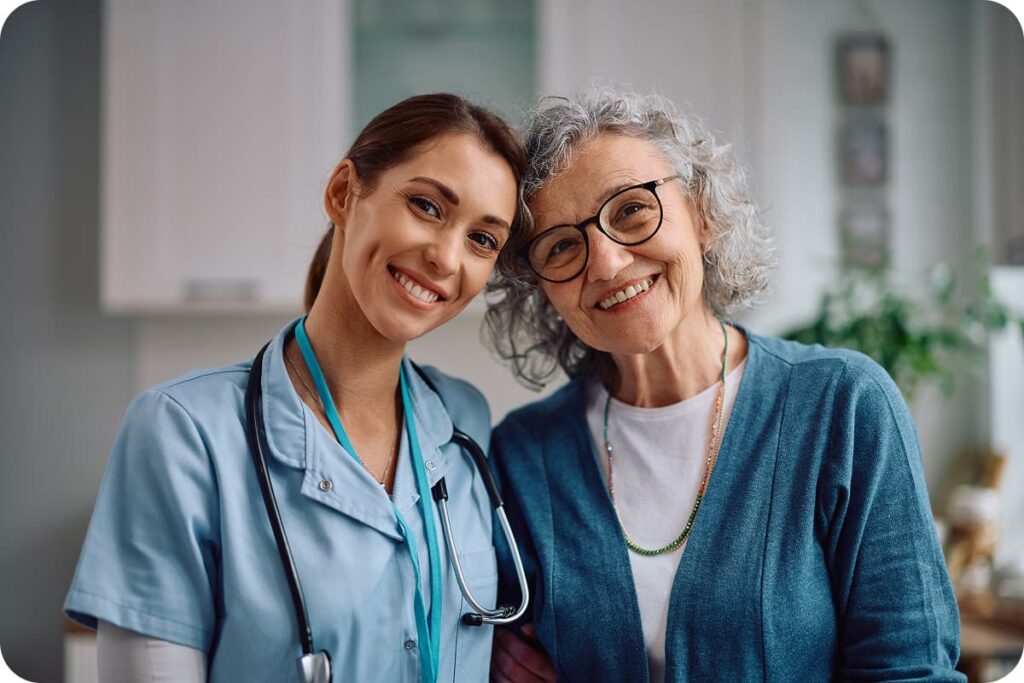 Healthcare provider and patient smiling 